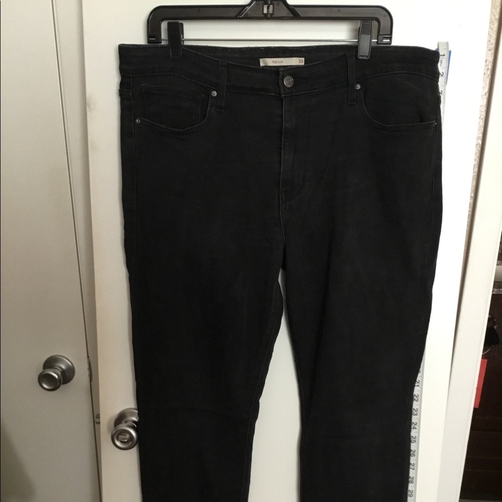 Levi’s black wash 712 slim 33 jeans